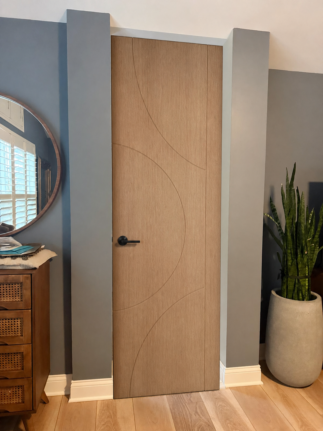 White Oak Single-Door Arc custom door installed in the proposed opening