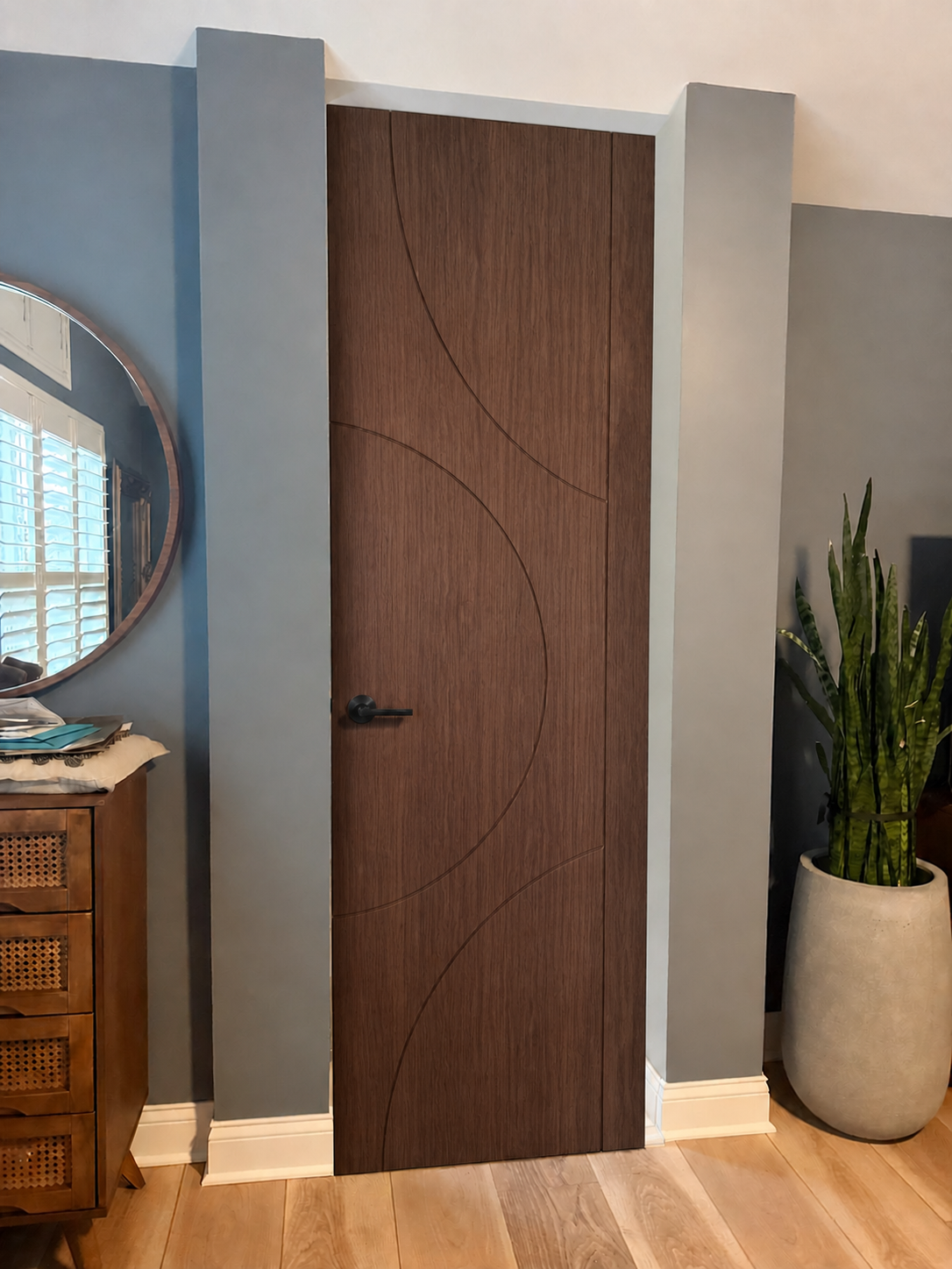 Premium Walnut Single-Door Arc custom door installed in the proposed opening