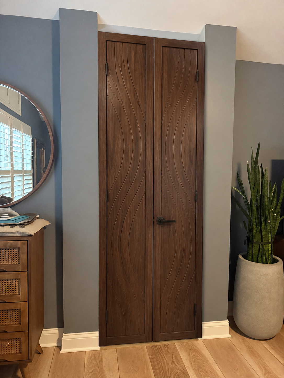 Premium Walnut French Pair - Wave custom door installed in the proposed opening