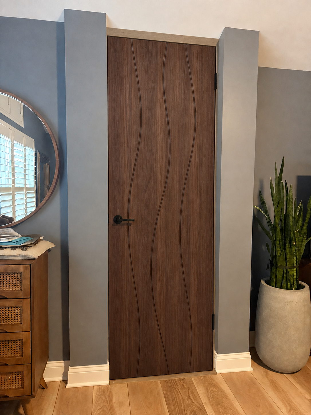 Premium Walnut Single-Door Wave custom door installed in the proposed opening